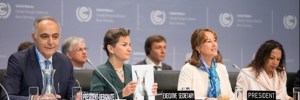Officials, including the Executive Secretary of the UN Framework Convention on Climate Change Christiana Figueres (second from left) at the opening plenary of the meeting.